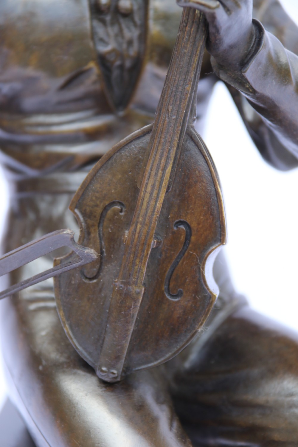  19th century French bronze study of a seated musician playing an early string instrument
 View XII