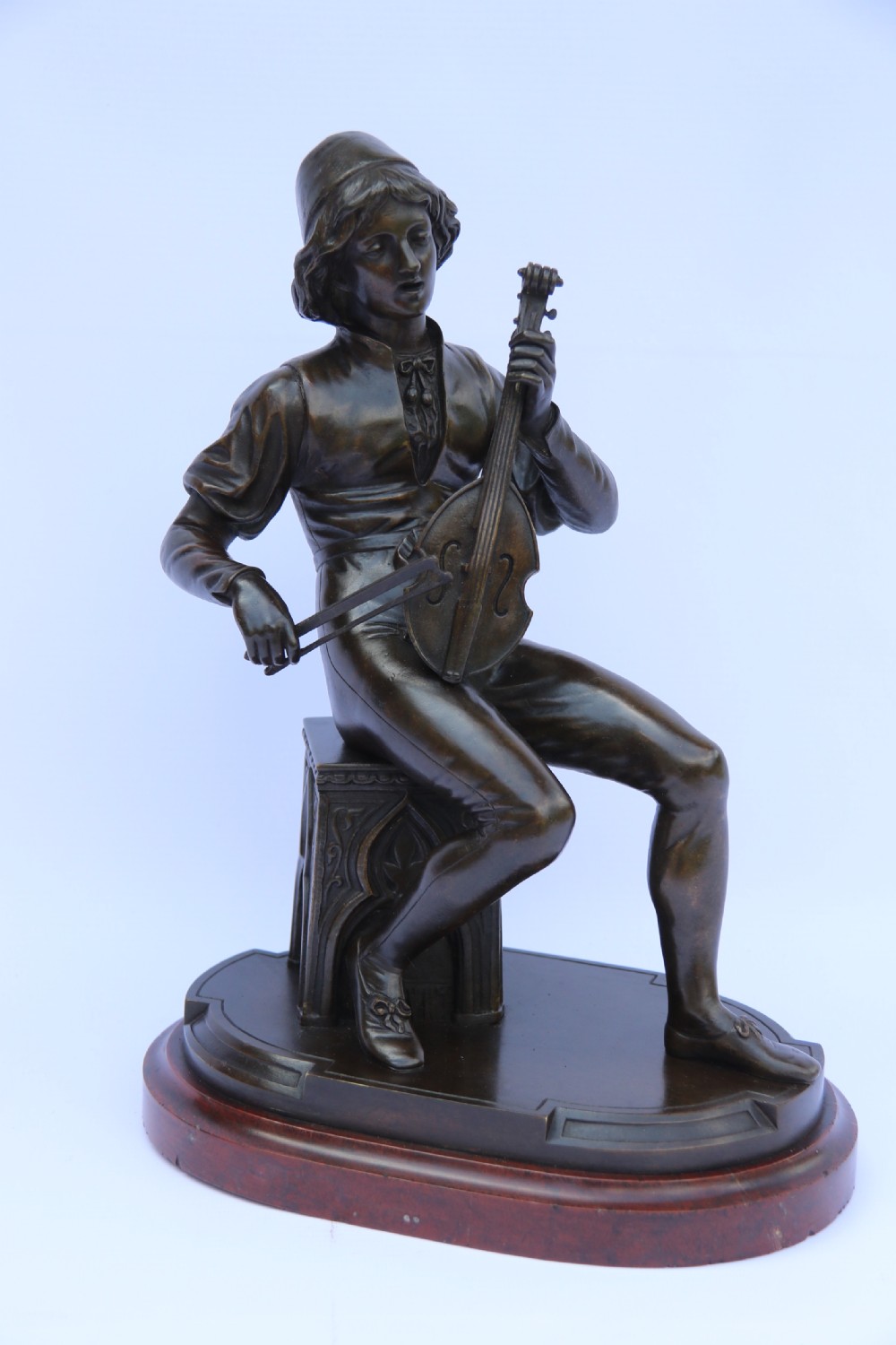  19th century French bronze study of a seated musician playing an early string instrument
 View XIII