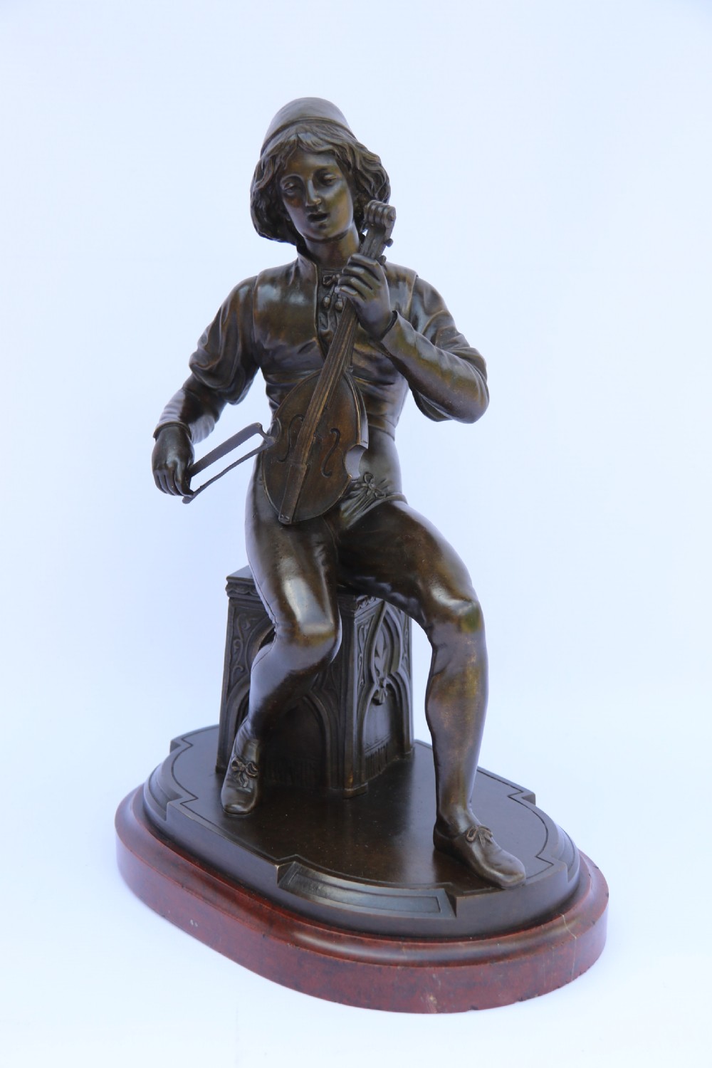  19th century French bronze study of a seated musician playing an early string instrument
 View XIV