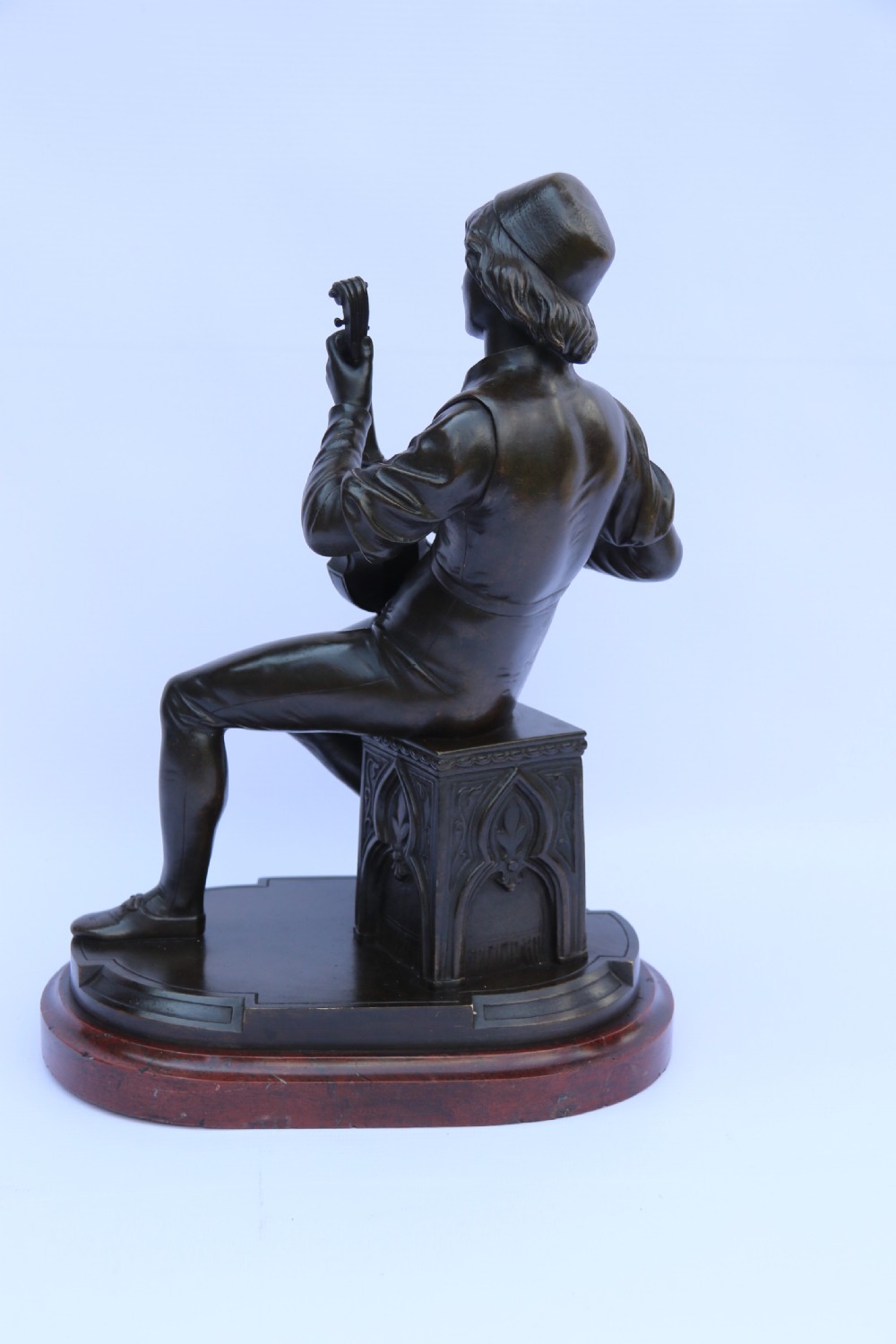  19th century French bronze study of a seated musician playing an early string instrument
 View XVII