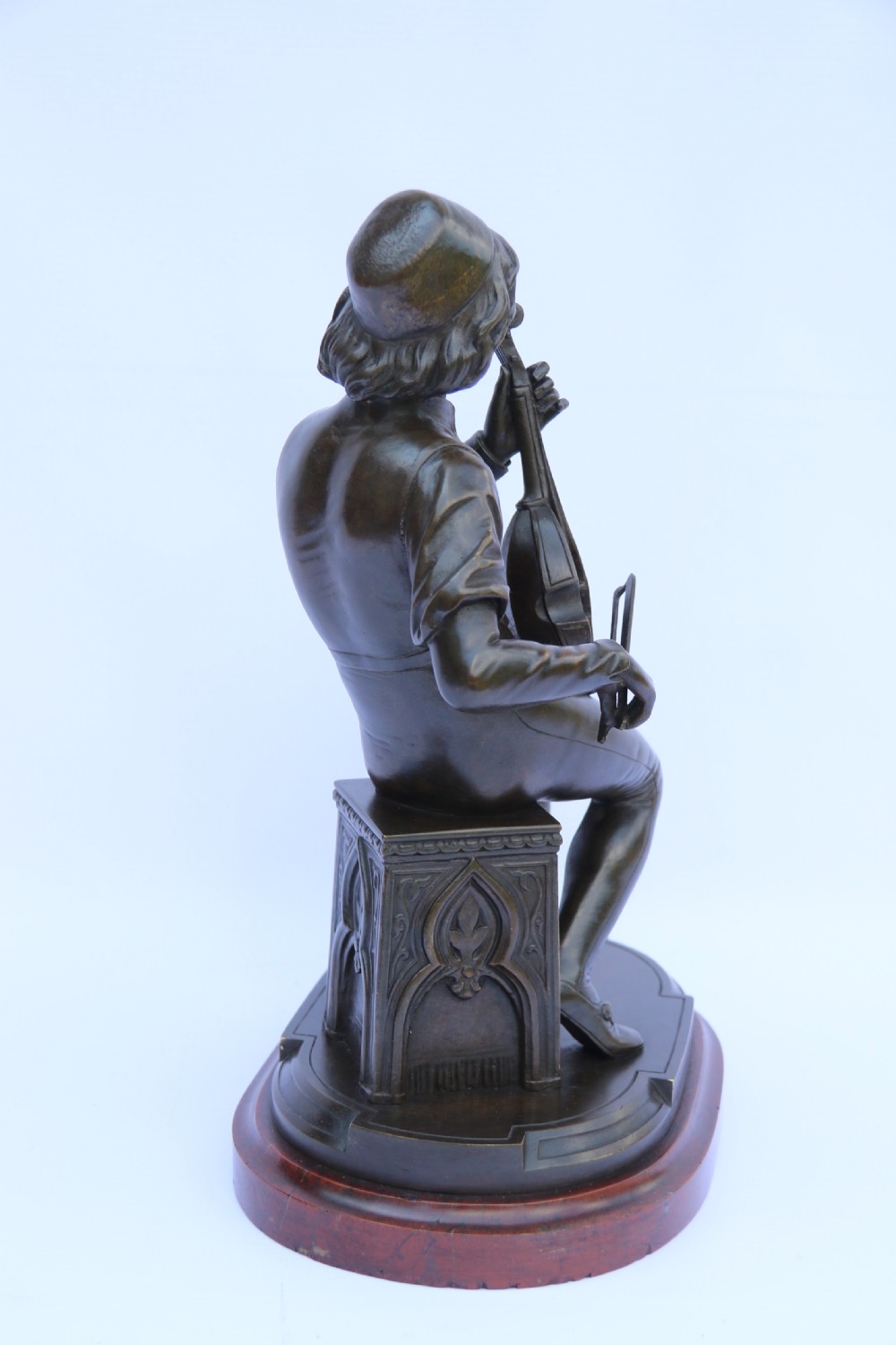  19th century French bronze study of a seated musician playing an early string instrument
 View XIX