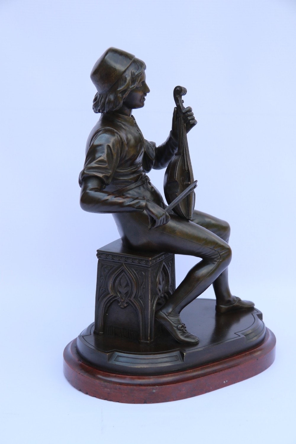  19th century French bronze study of a seated musician playing an early string instrument
 View XX