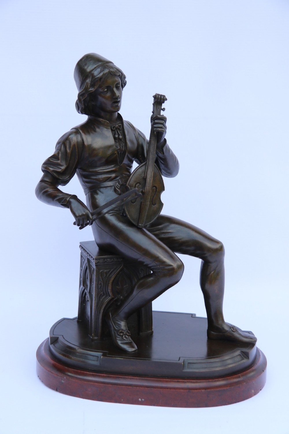  19th century French bronze study of a seated musician playing an early string instrument
 View XXI