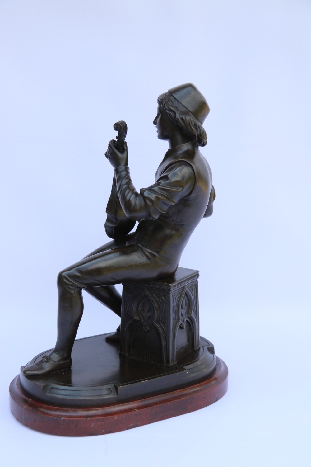  19th century French bronze study of a seated musician playing an early string instrument
 View XXIII