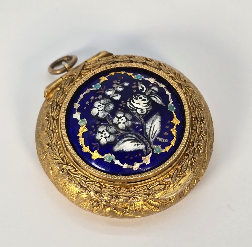 A French mid 19th C ladies gilt and enamel patch box