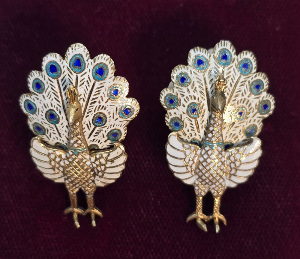 A pair of silver and enamel Asian peacock earrings 