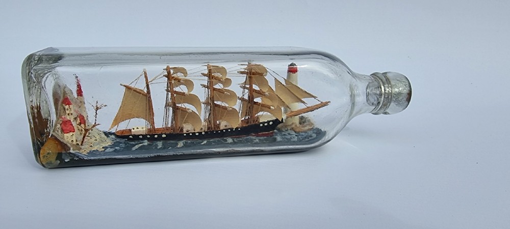 A rare four mast 18th century ship in a bottle, English folk art. View II