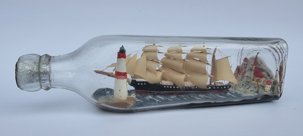 A rare four mast 18th century ship in a bottle, English folk art. View XII