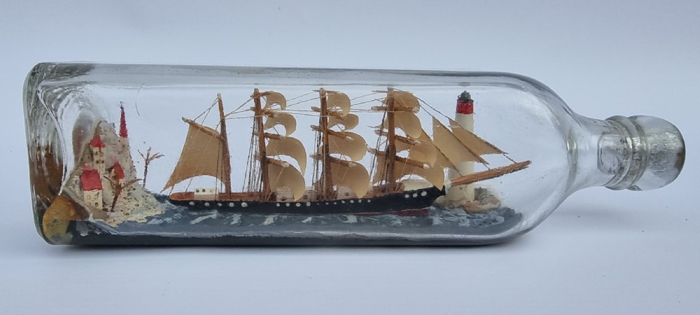 A rare four mast 18th century ship in a bottle, English folk art. View XIII