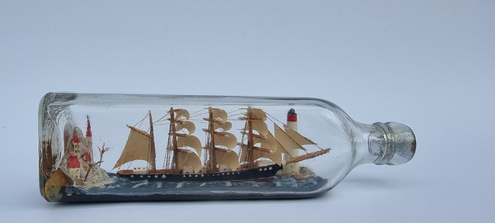 A rare four mast 18th century ship in a bottle, English folk art. View XIV