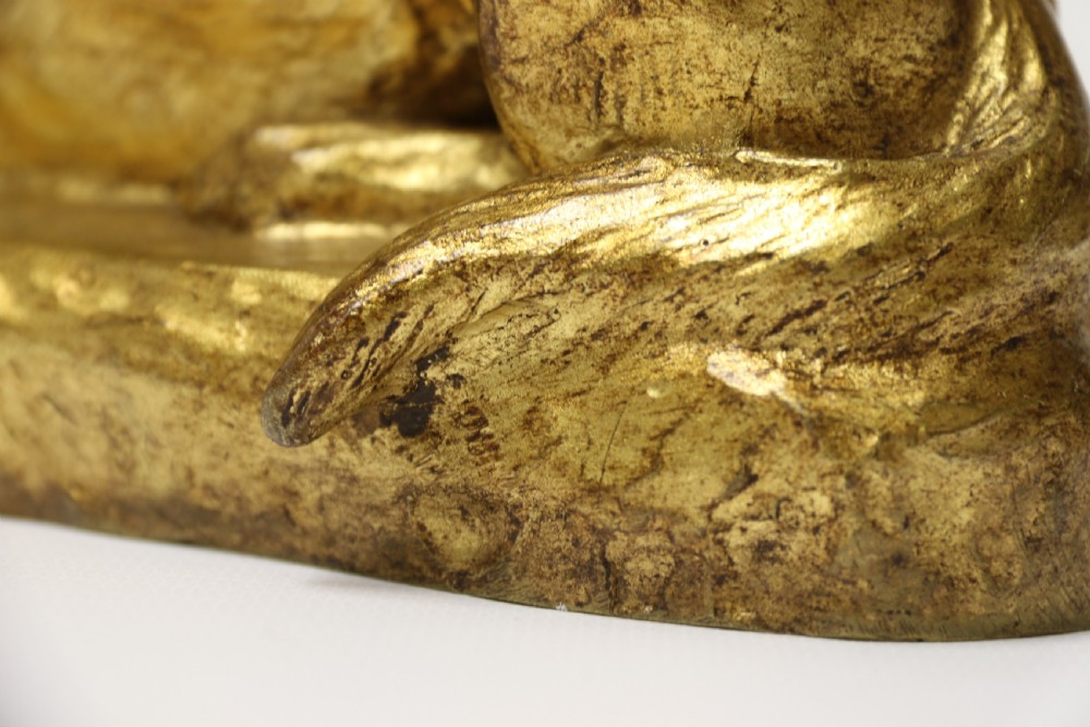 A French gilt bronze sculpture depicting two German Shepherd dogs on a naturalistic integrated base, one resting lying down and one sitting upright behind. View XIV
