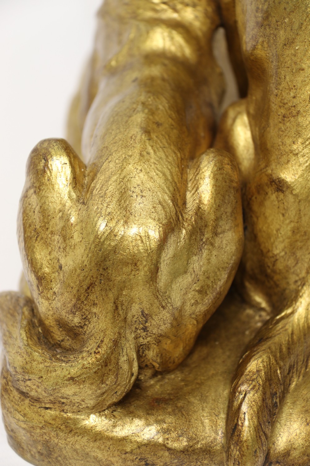 A French gilt bronze sculpture depicting two German Shepherd dogs on a naturalistic integrated base, one resting lying down and one sitting upright behind. View XIX
