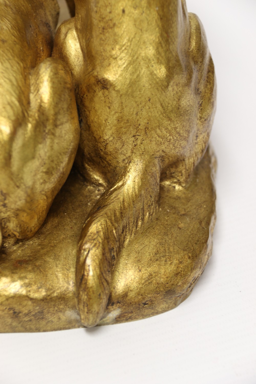 A French gilt bronze sculpture depicting two German Shepherd dogs on a naturalistic integrated base, one resting lying down and one sitting upright behind. View XX