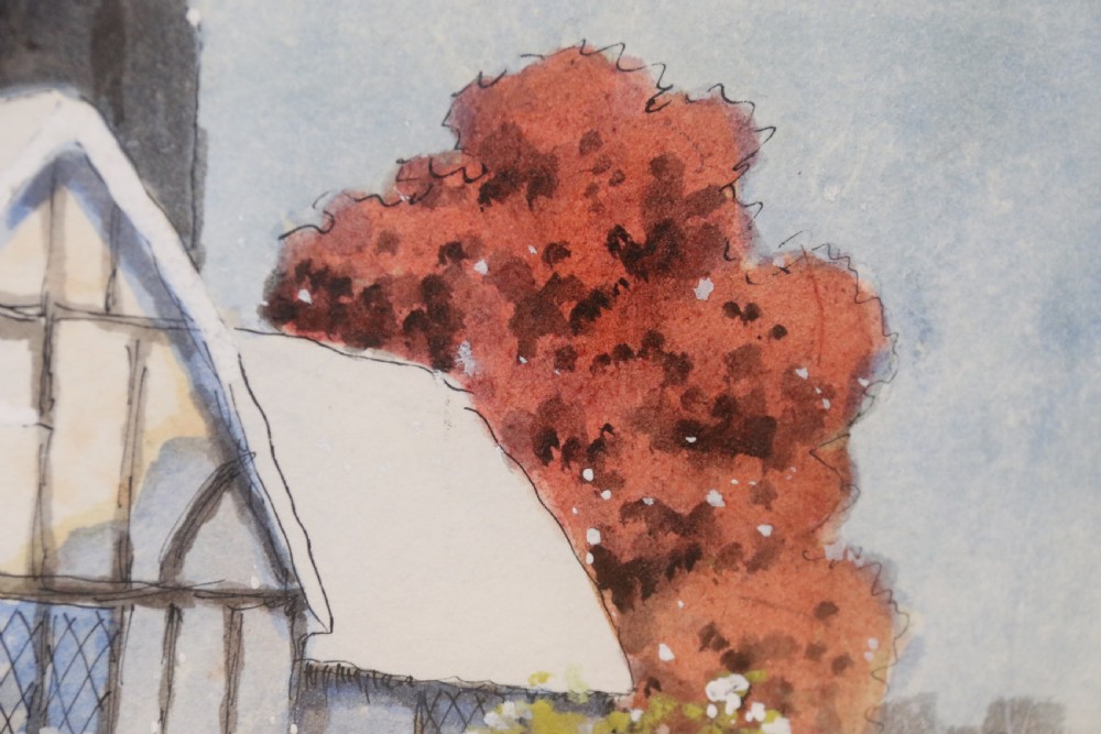 A pair of framed 1930s watercolour paintings by Ernest Uden depicting snowy rural winter scenes featuring a windmill and a timber-framed building. View IV