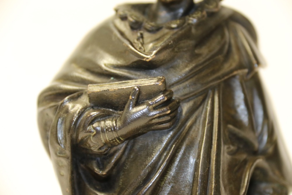 A nineteenth-century patinated bronze sculpture depicting painter Anthony van Dyck in seventeenth-century dress standing on a circular integral base. View IX