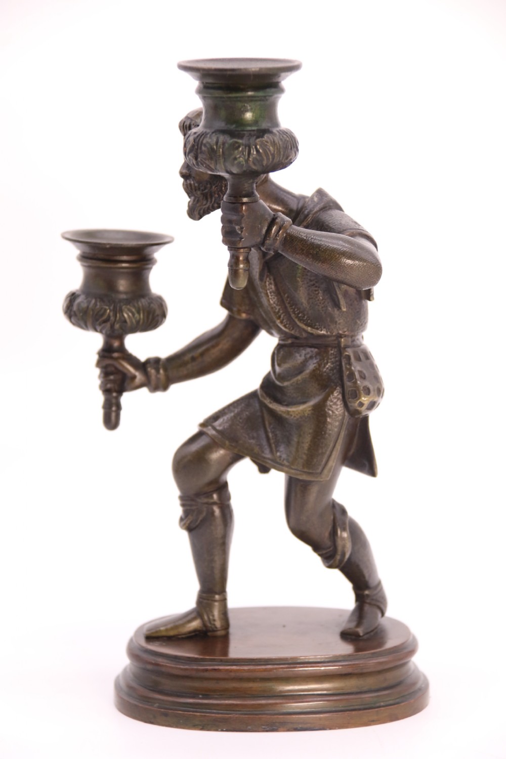 A pair of 19th-century patinated dark bronze double candlesticks featuring sculpted male figures standing on oval bases and holding two sconces each. View XVII