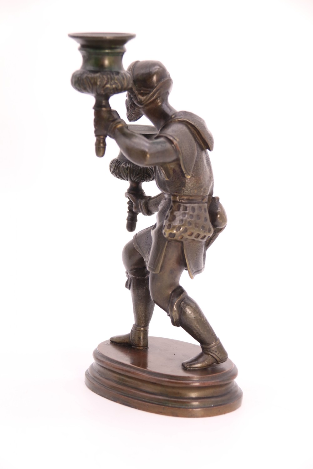 A pair of 19th-century patinated dark bronze double candlesticks featuring sculpted male figures standing on oval bases and holding two sconces each. View XIX