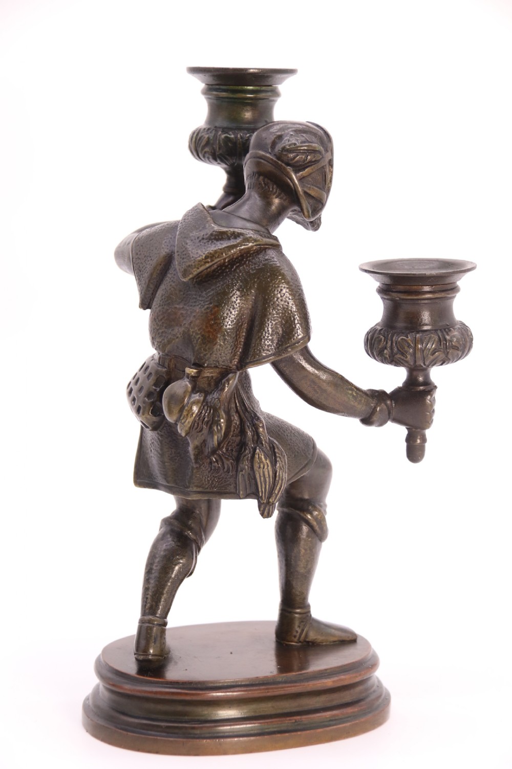 A pair of 19th-century patinated dark bronze double candlesticks featuring sculpted male figures standing on oval bases and holding two sconces each. View XXII