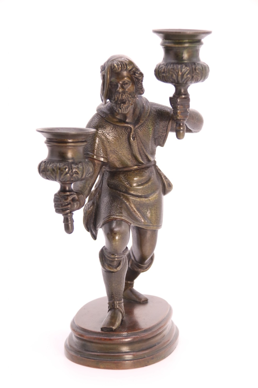A pair of 19th-century patinated dark bronze double candlesticks featuring sculpted male figures standing on oval bases and holding two sconces each. View XXV