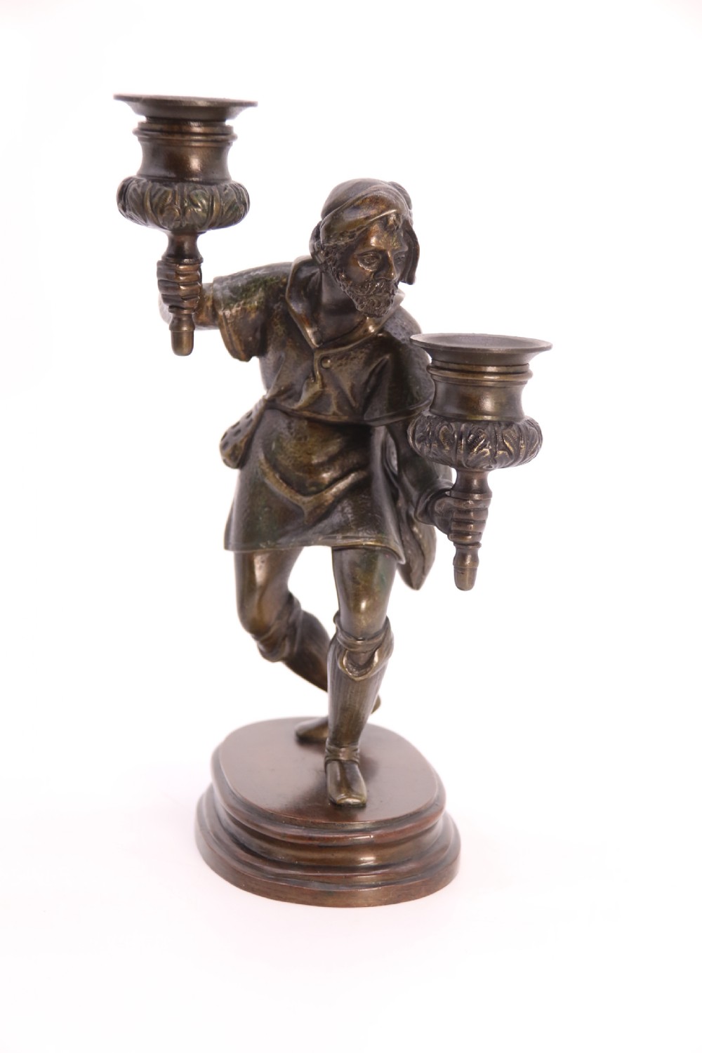 A pair of 19th-century patinated dark bronze double candlesticks featuring sculpted male figures standing on oval bases and holding two sconces each. View XXVII