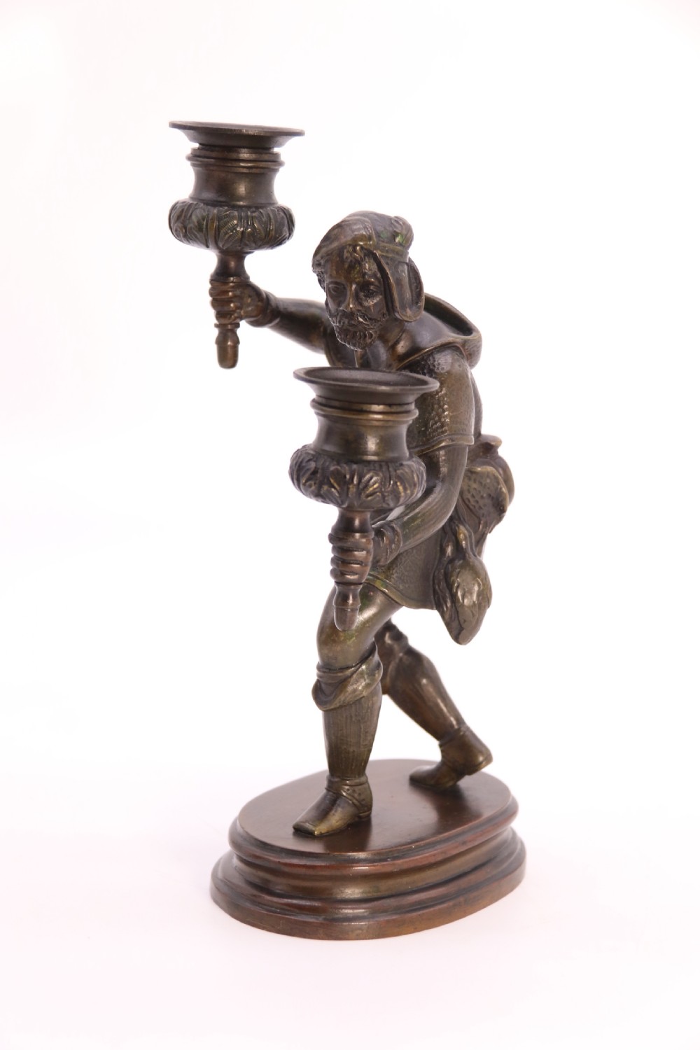A pair of 19th-century patinated dark bronze double candlesticks featuring sculpted male figures standing on oval bases and holding two sconces each. View XXVIII