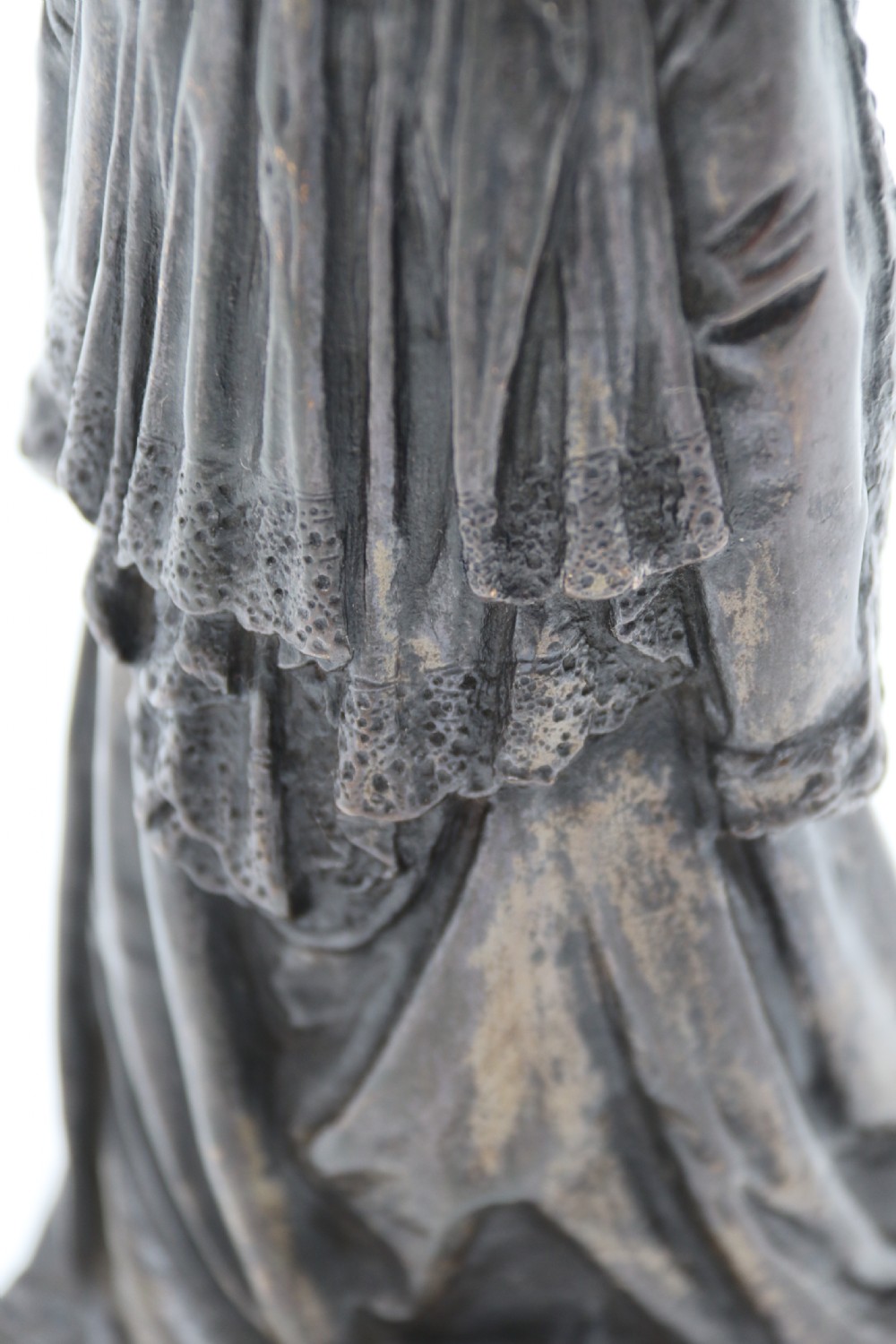 A dark patinated bronze statuette depicting Queen Victoria standing in full ceremonial robes, wearing a crown and holding a sceptre and orb. View XIII