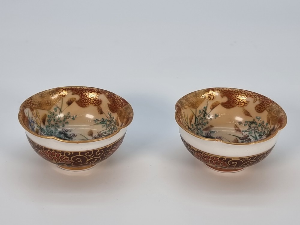 A pair of round Japanese Kutani porcelain miniature bowls with lobed gilded rims and interior hand-painted enamel chrysanthemum motifs. View III