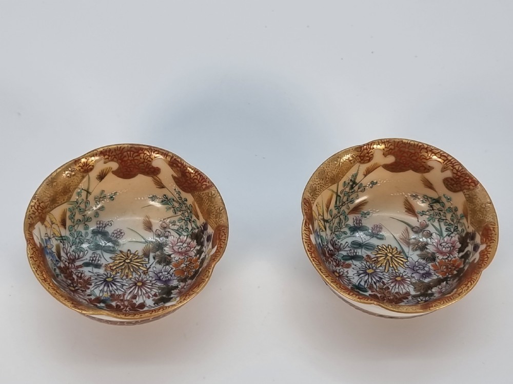 A pair of round Japanese Kutani porcelain miniature bowls with lobed gilded rims and interior hand-painted enamel chrysanthemum motifs. View IV