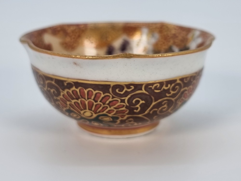 A pair of round Japanese Kutani porcelain miniature bowls with lobed gilded rims and interior hand-painted enamel chrysanthemum motifs. View VIII