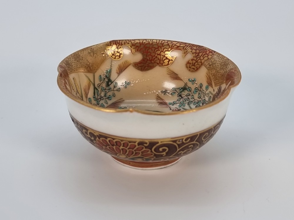 A pair of round Japanese Kutani porcelain miniature bowls with lobed gilded rims and interior hand-painted enamel chrysanthemum motifs. View XVIII
