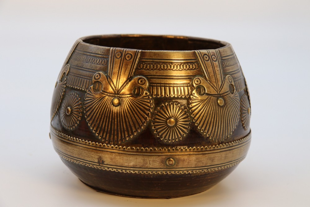 A pair of mid-19th-century Indian brass ceremonial bowls featuring intricate hand-engraved bird and sunburst motifs. View VIII