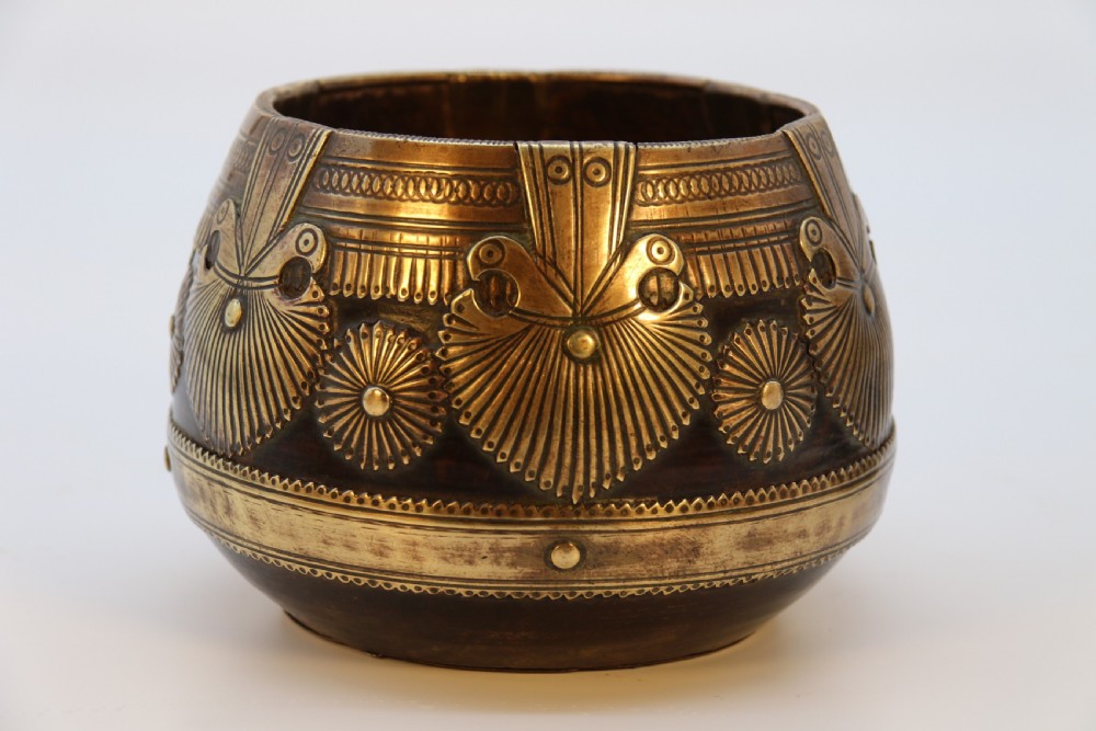 A pair of mid-19th-century Indian brass ceremonial bowls featuring intricate hand-engraved bird and sunburst motifs. View IX