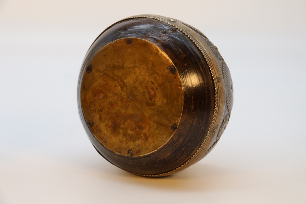 A pair of mid-19th-century Indian brass ceremonial bowls featuring intricate hand-engraved bird and sunburst motifs. View XIII
