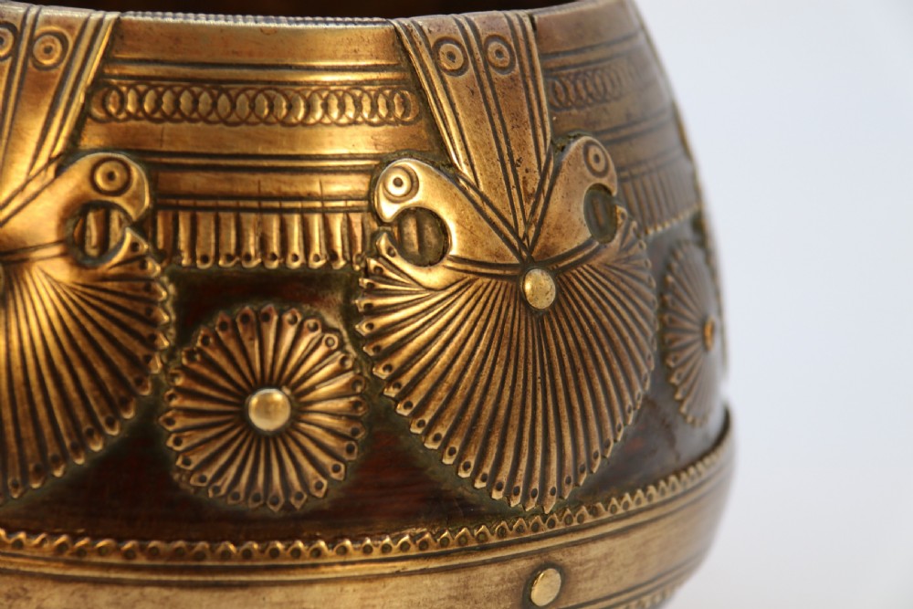 A pair of mid-19th-century Indian brass ceremonial bowls featuring intricate hand-engraved bird and sunburst motifs. View XIV