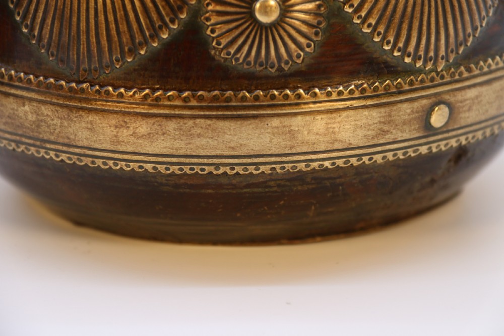 A pair of mid-19th-century Indian brass ceremonial bowls featuring intricate hand-engraved bird and sunburst motifs. View XVI