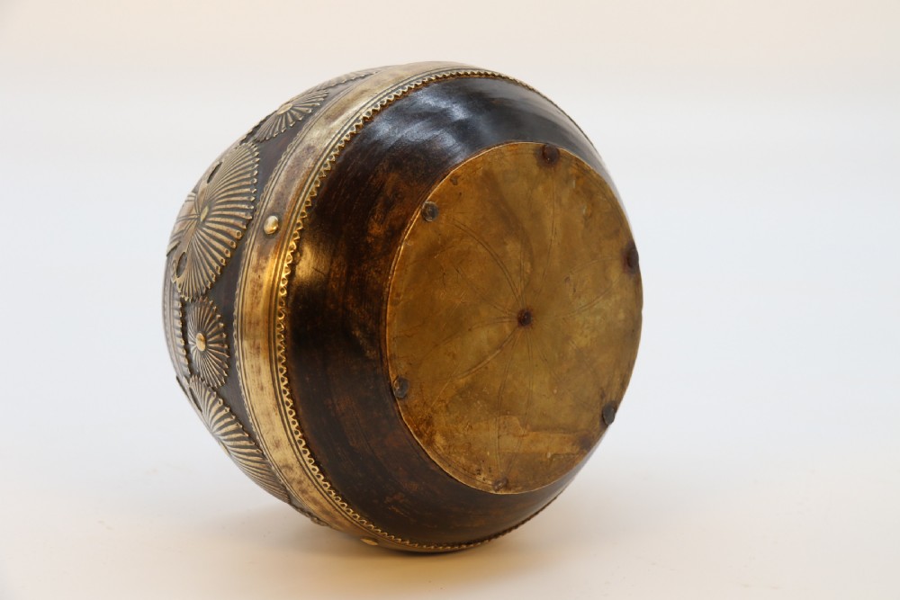 A pair of mid-19th-century Indian brass ceremonial bowls featuring intricate hand-engraved bird and sunburst motifs. View XVIII