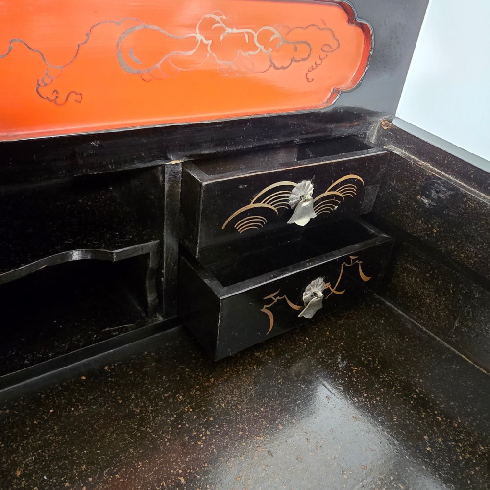 A black lacquer Japanese writing box decorated with detailed gold botanical and bird illustrations, featuring a hinged lid opening to internal correspondence slots. View XVII
