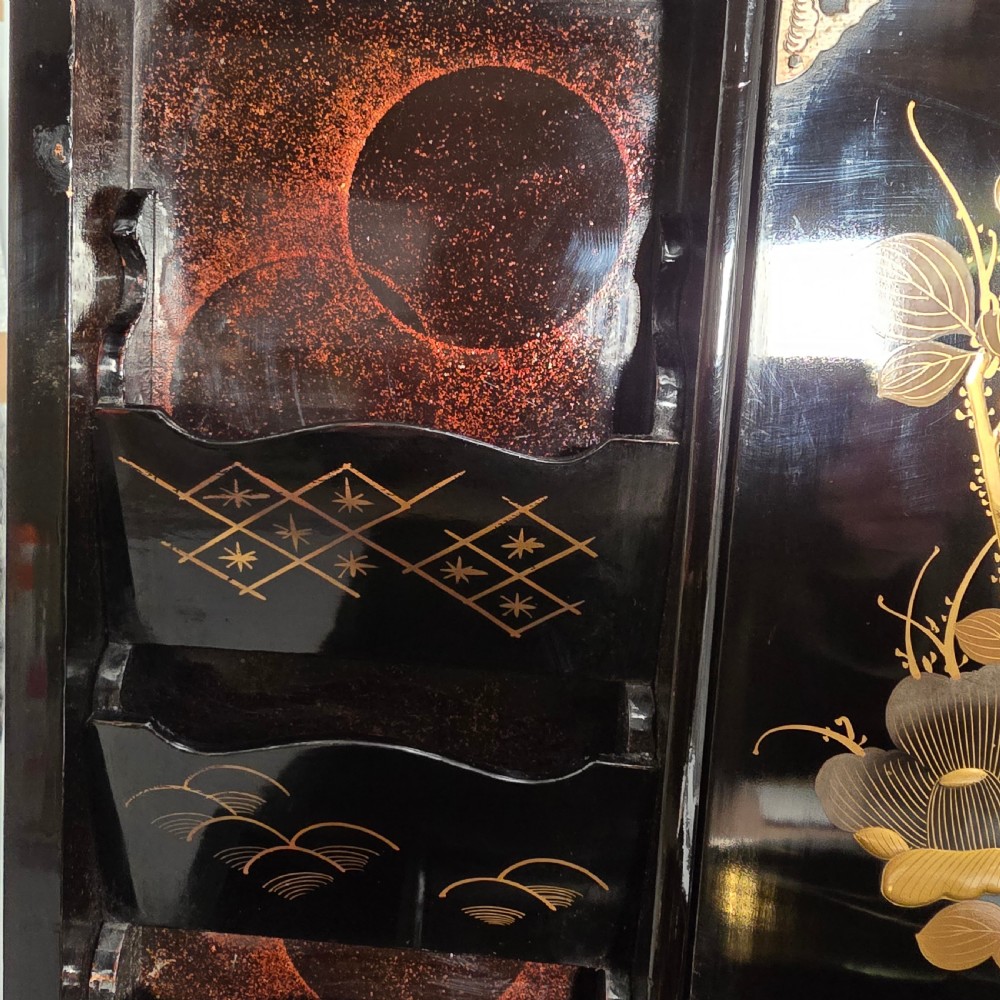 A black lacquer Japanese writing box decorated with detailed gold botanical and bird illustrations, featuring a hinged lid opening to internal correspondence slots. View XIX