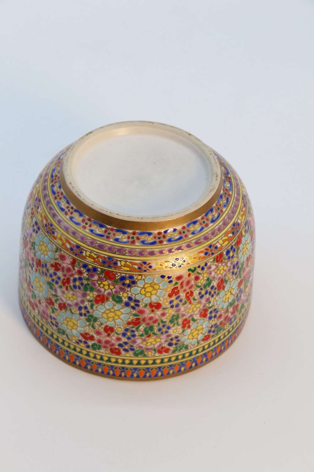 A polychrome enamelled ceramic jar with a fitted stepped lid featuring intricate floral motifs and a gilded conical finial. View VIII
