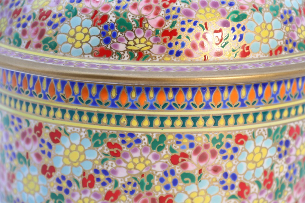 A polychrome enamelled ceramic jar with a fitted stepped lid featuring intricate floral motifs and a gilded conical finial. View XVII