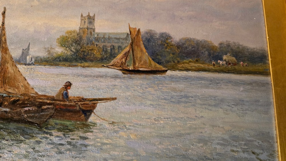 An oil painting depicting a harbour scene with sailboats and buildings, encased in a carved gold gilt frame. View V