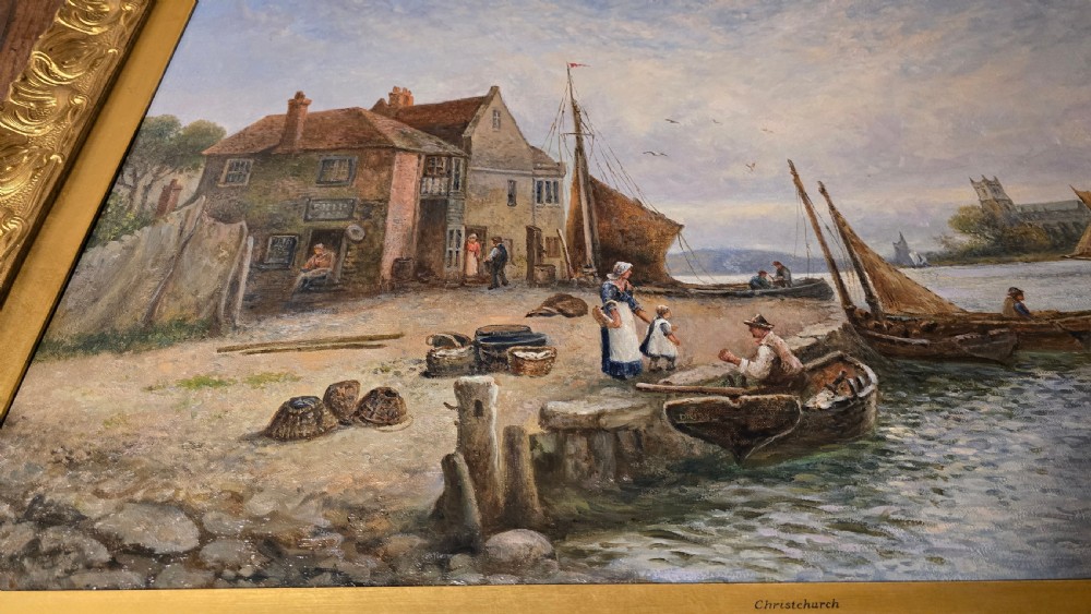 An oil painting depicting a harbour scene with sailboats and buildings, encased in a carved gold gilt frame. View VIII