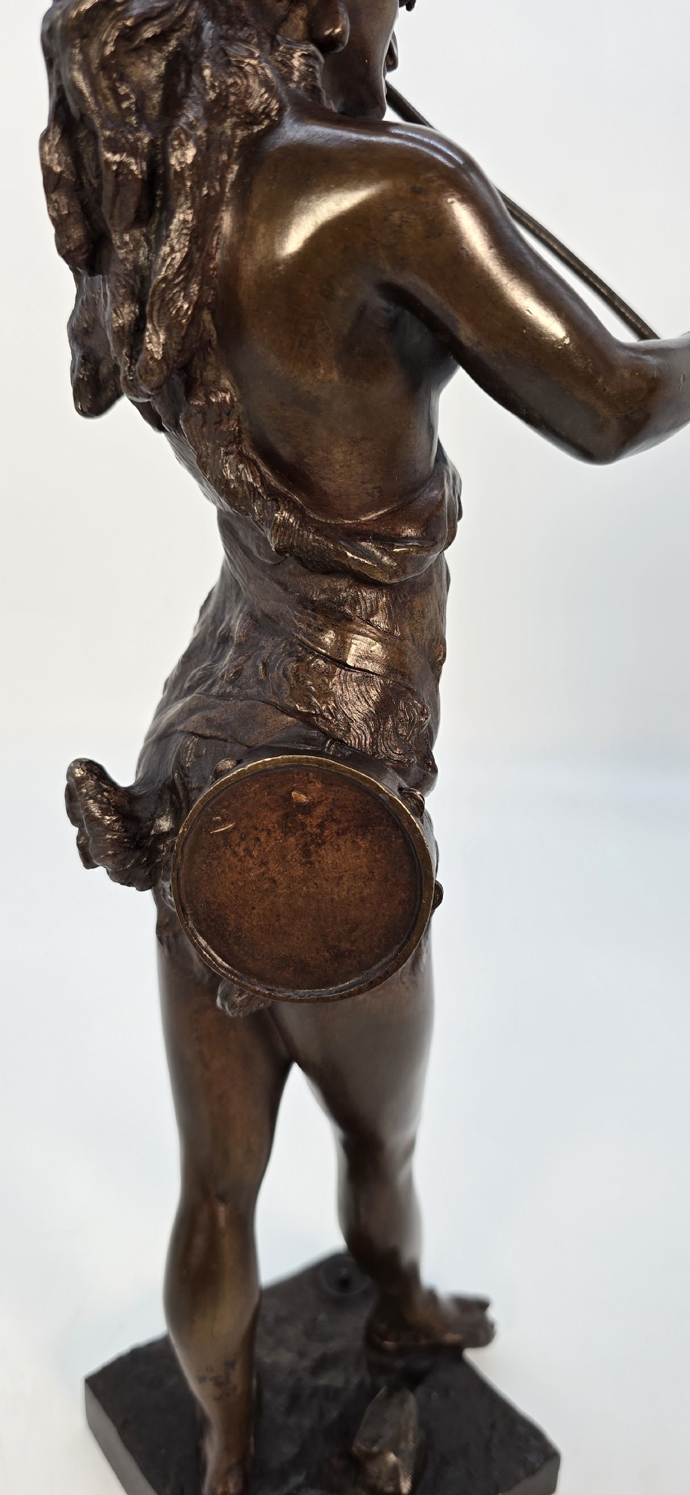 A pair of late 19th-century bronze statuettes depicting theatrical figures playing stringed musical instruments on square bases. View XIX
