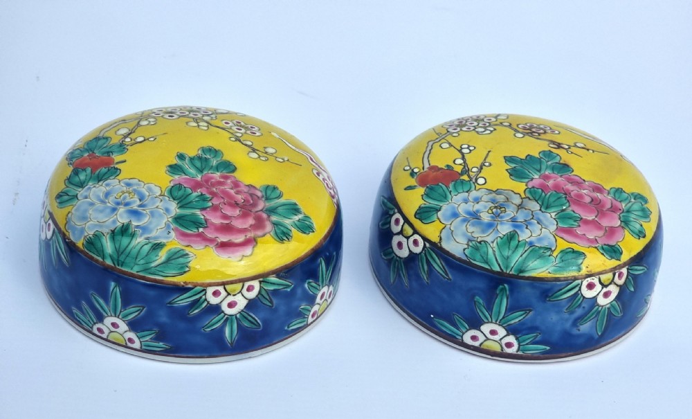 A matching pair of yellow porcelain ginger jars featuring hand-painted blue and turquoise phoenixes among peonies and floral branches, topped with deep blue decorated lids. View XIII