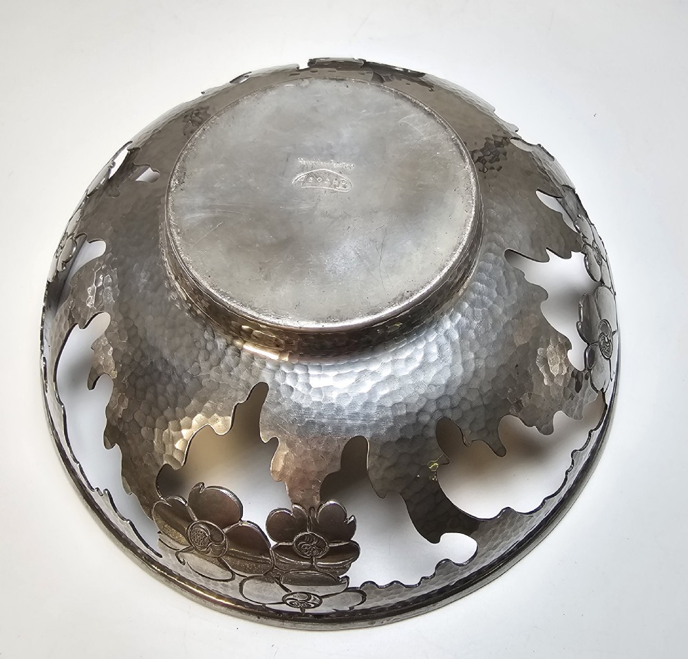 A pierced pewter bowl with a  marbled Bakelite liner from the Art Deco period  View X