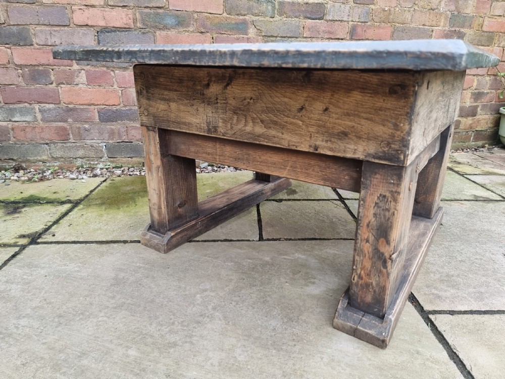 A low square rustic oak coffee table featuring a dark hand-painted geometric top and heavy timber legs. View XI