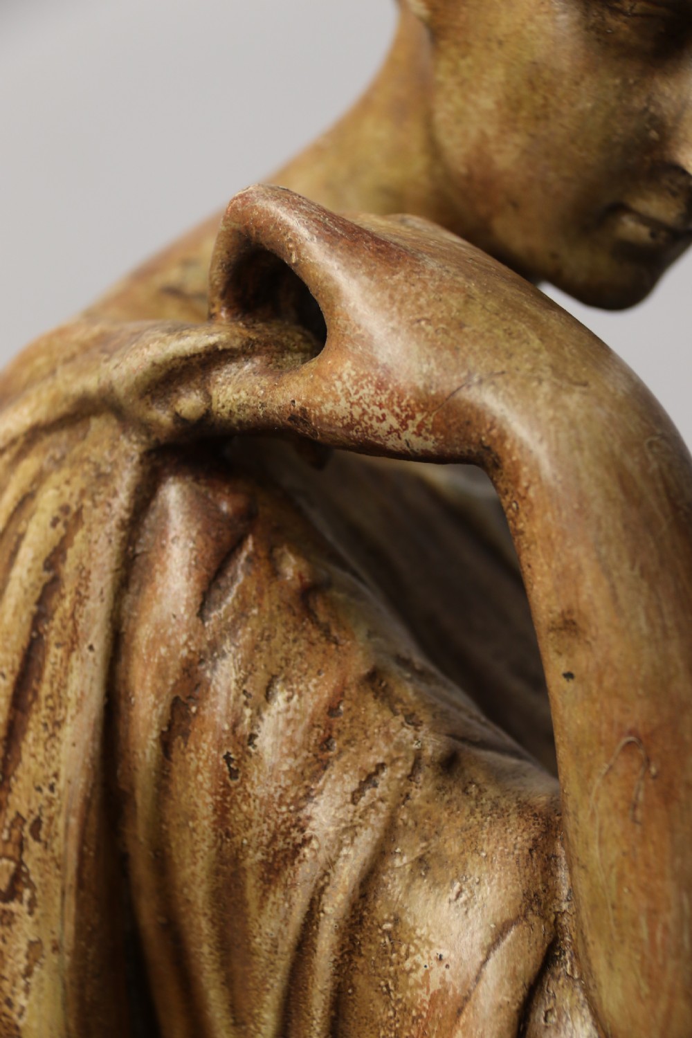 A nineteenth-century Neoclassical sculpture depicting Diana the Huntress draped in classical robes standing on a square base with a warm beige patinated finish. View XIII