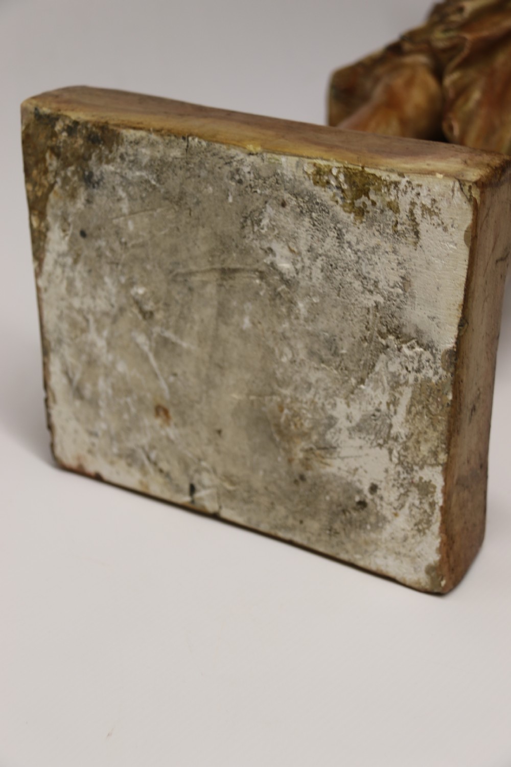 A nineteenth-century Neoclassical sculpture depicting Diana the Huntress draped in classical robes standing on a square base with a warm beige patinated finish. View XX