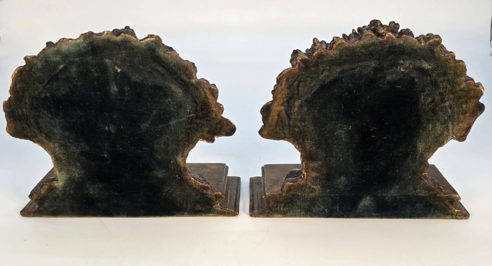 A pair of antique Regency period bookends featuring detailed sculpted wheat sheaves with a gilded finish mounted on stepped bases. View VI