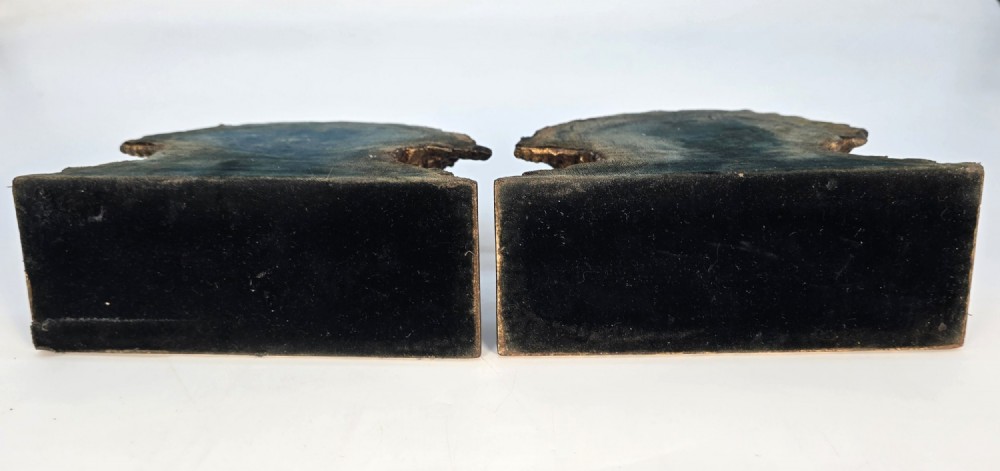 A pair of antique Regency period bookends featuring detailed sculpted wheat sheaves with a gilded finish mounted on stepped bases. View VII